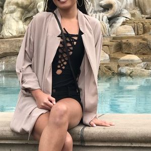 Black lace up swimsuit with a cross back